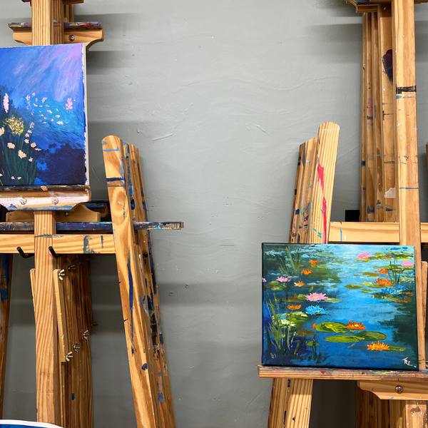 Acrylic landscape painting on a studio easel