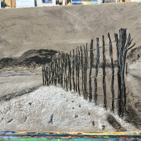 Graphite drawing of a fence on sand dunes
