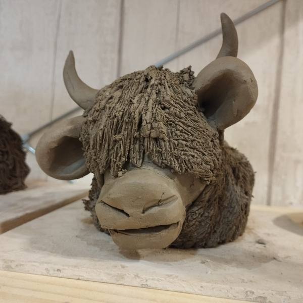 Clay Highland Cow sculpture