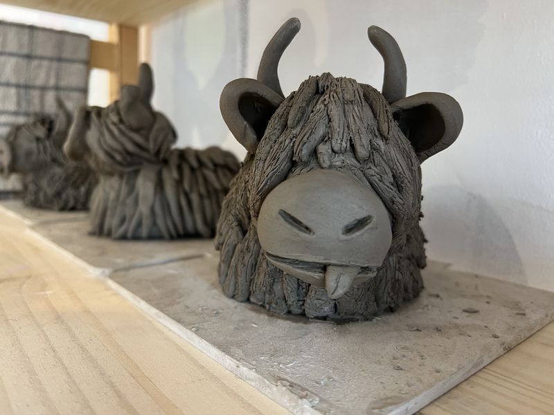 Hand-built clay highland cow